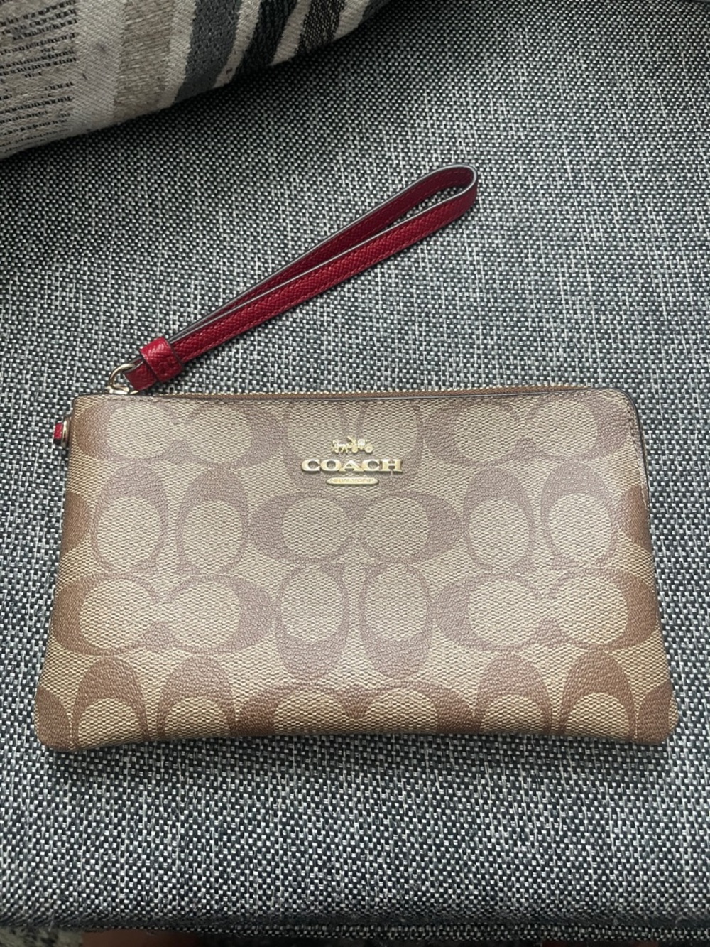 Coach Signature Canvas Wristlet in Brown with Red Strap